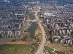 China Unveils $1.4 Trillion Plan to Bail Out Local Governments Facing Debt Crisis
